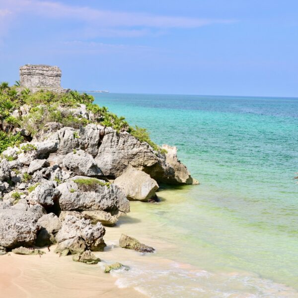 a view of the ocean from a rocky cliff